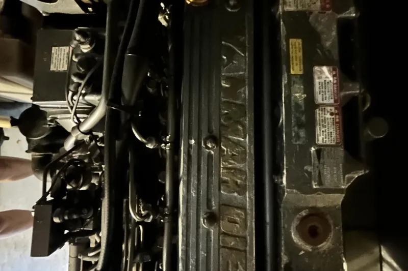 Knot Done Yet Yacht Photos Pics Engine of a 2002 Mainship 430 Trawler, featuring detailed mechanical components.