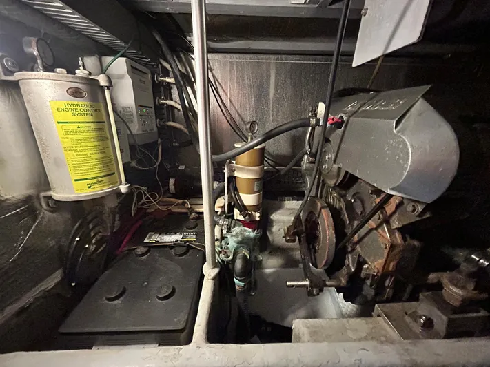 Knot Done Yet Yacht Photos Pics Engine room of 2002 Mainship 430 Trawler with hydraulic control system.