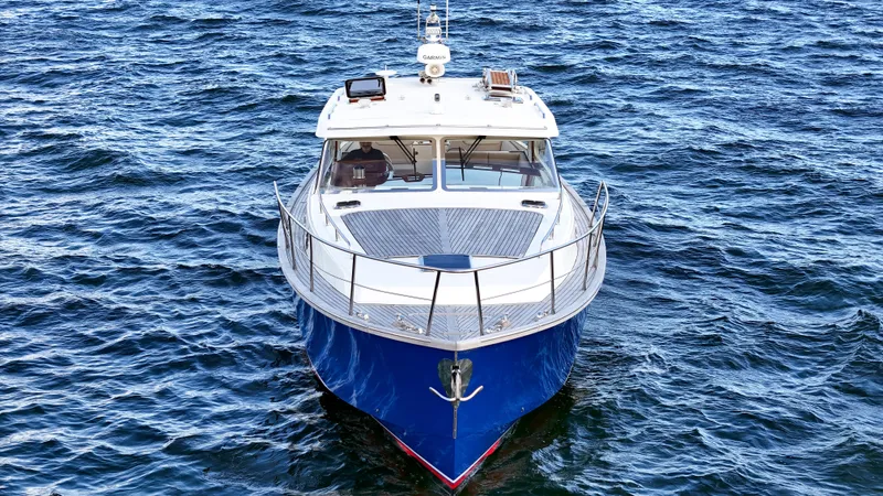 Noi Qauttro Yacht Photos Pics Custom 48 boat from 2010 on open water, front view.