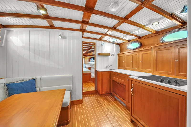 Noi Qauttro Yacht Photos Pics Luxurious 2010 Custom 48 yacht interior with wood finish and modern kitchen amenities.