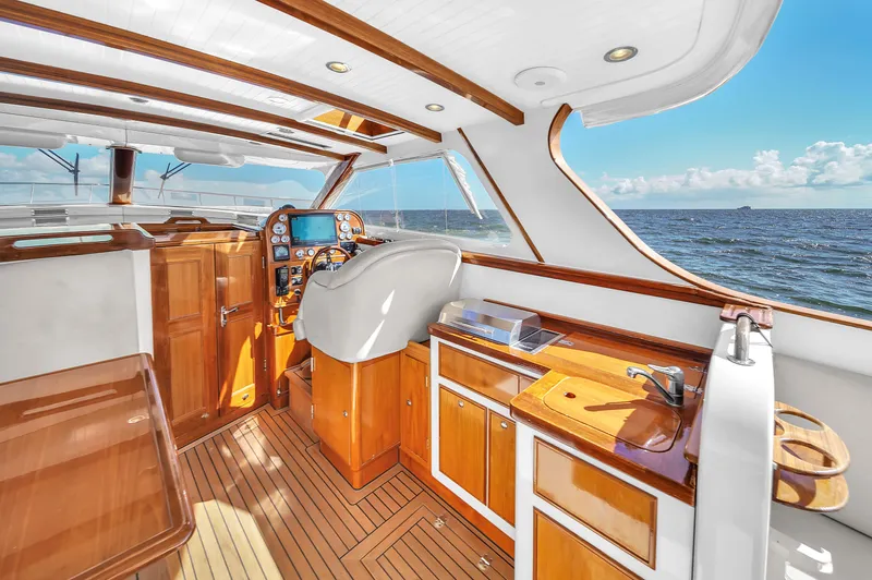 Noi Qauttro Yacht Photos Pics Luxurious 2010 Custom 48 yacht interior with wooden finishes and ocean view.