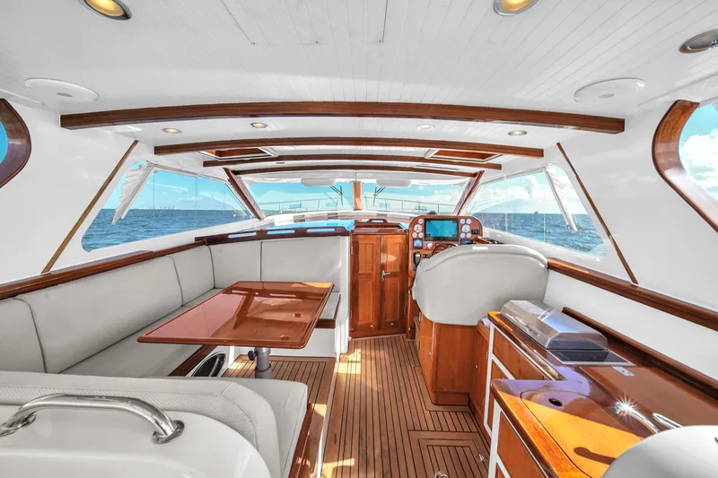 Noi Qauttro Yacht Photos Pics Luxurious 2010 Custom 48 yacht interior with wood accents and ocean view.