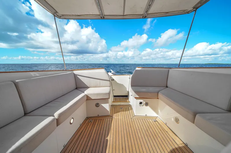 Noi Qauttro Yacht Photos Pics Spacious deck of 2010 Custom 48 yacht with ocean view and comfortable seating.