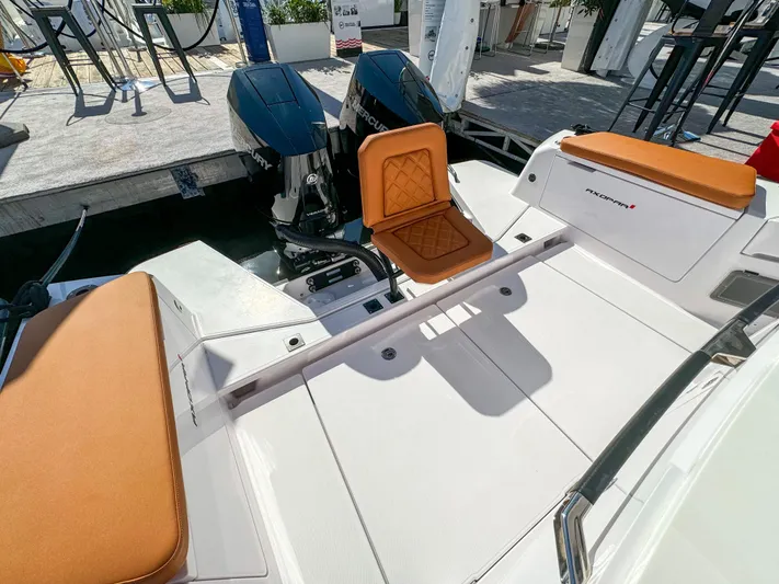  Yacht Photos Pics 2024 Axopar 37XC CROSS CABIN boat with dual engines and orange seating.