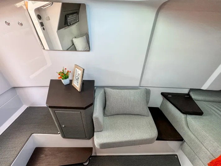  Yacht Photos Pics 2024 Axopar 37XC CROSS CABIN interior with modern seating and decor.