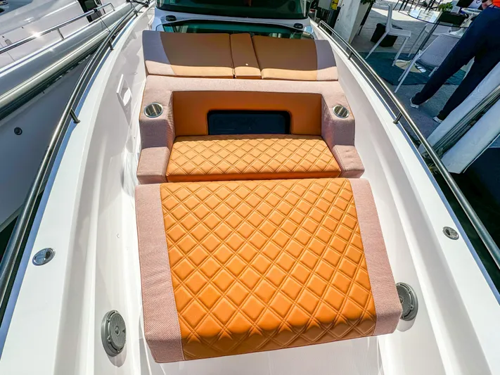  Yacht Photos Pics 2024 Axopar 37XC CROSS CABIN with orange quilted seating in the bow area.