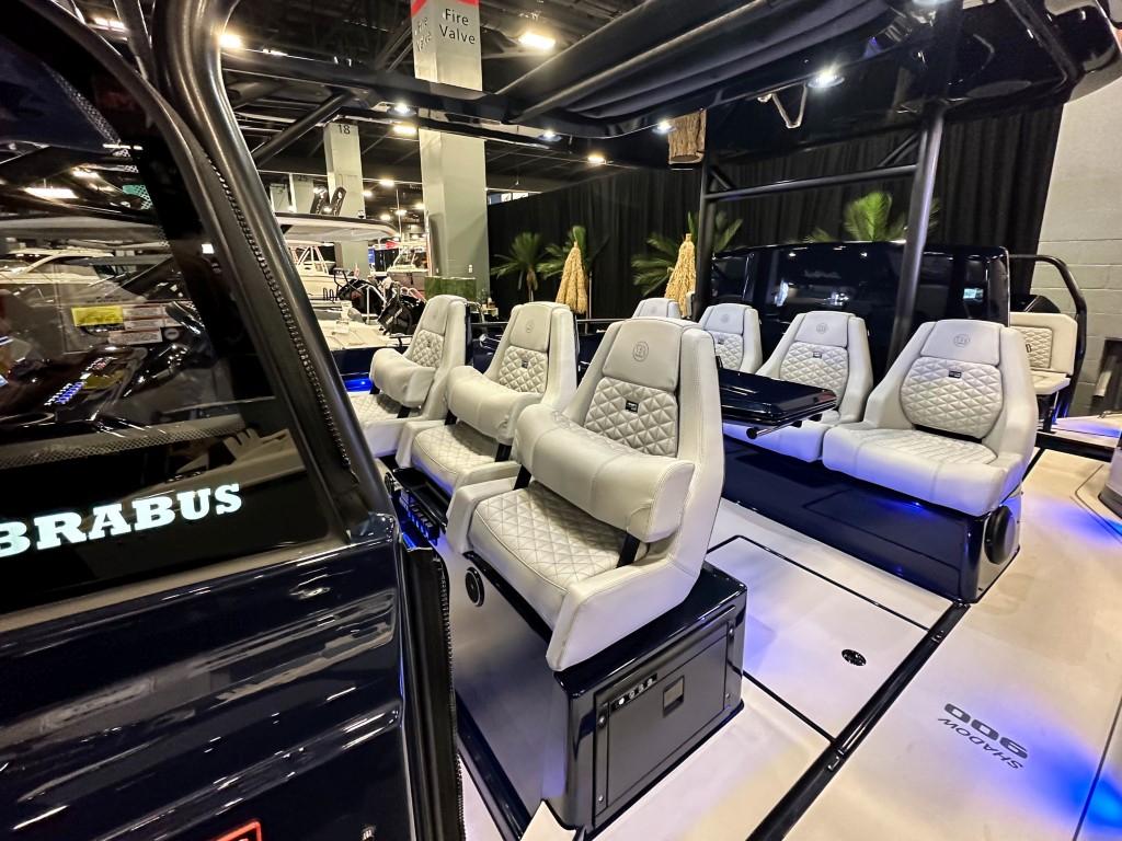 Luxurious interior of 2023 BRABUS Shadow 900 ST boat with plush seating.