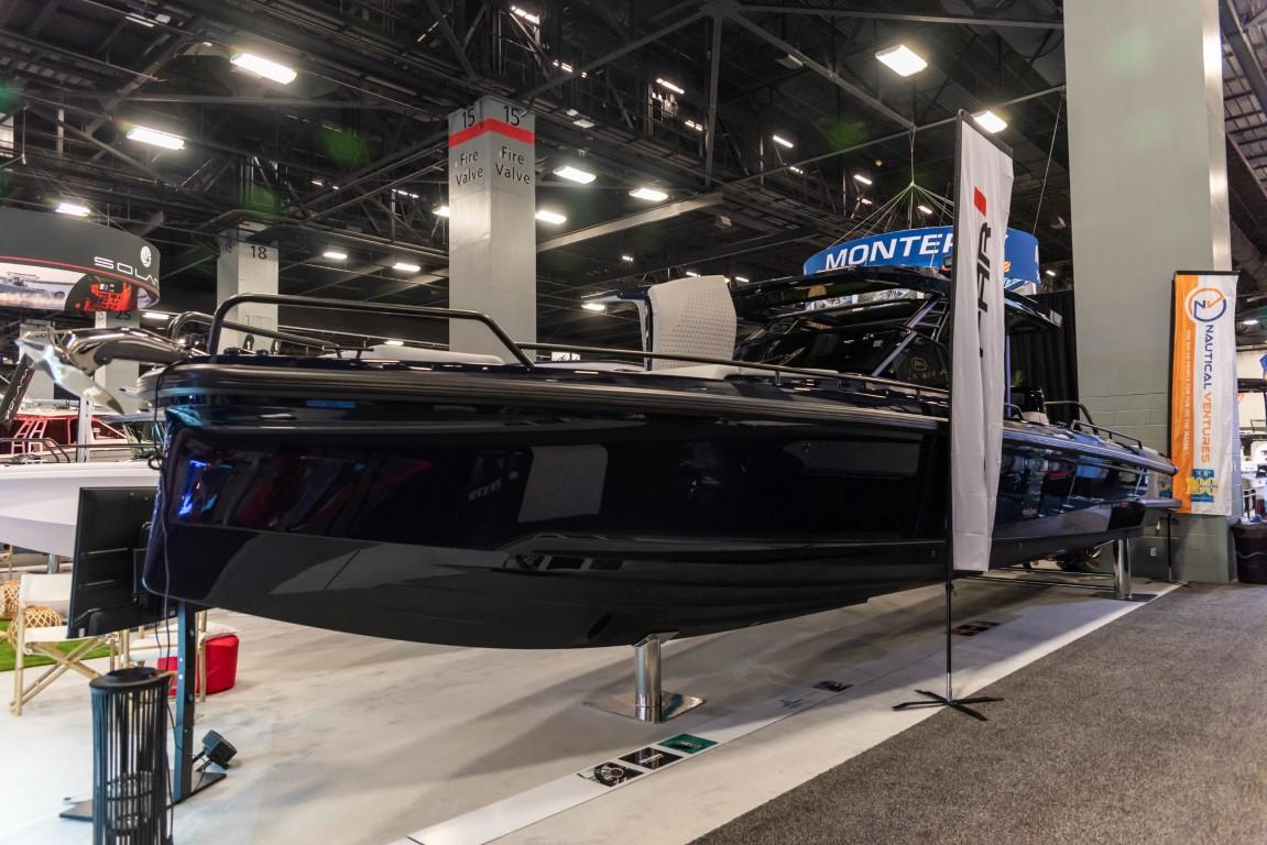 2023 BRABUS Shadow 900 ST luxury boat displayed at an indoor exhibition.