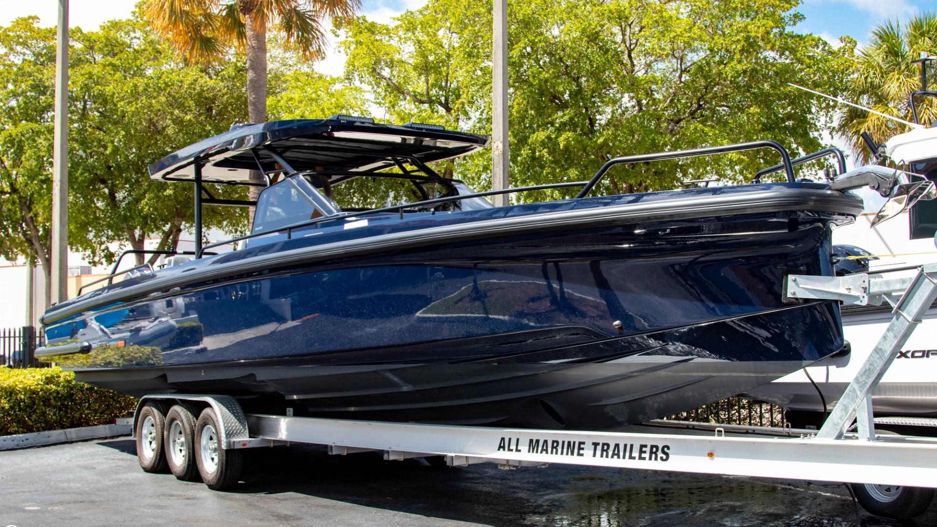 2023 BRABUS Shadow 900 ST boat on All Marine Trailers under sunny skies.