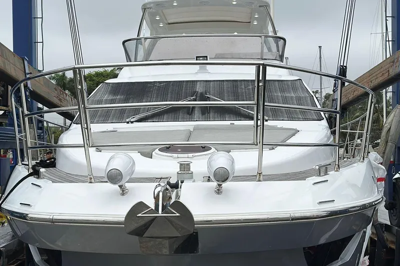  Yacht Photos Pics 2014 Azimut 54 yacht in dry dock, showcasing sleek design and modern features.