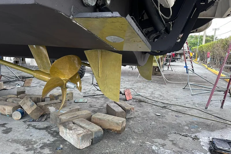  Yacht Photos Pics Propeller and rudder of a 2014 Azimut 54 yacht on dry dock.