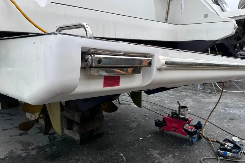  Yacht Photos Pics 2014 Azimut 54 yacht undergoing maintenance, showing stern details and propellers.