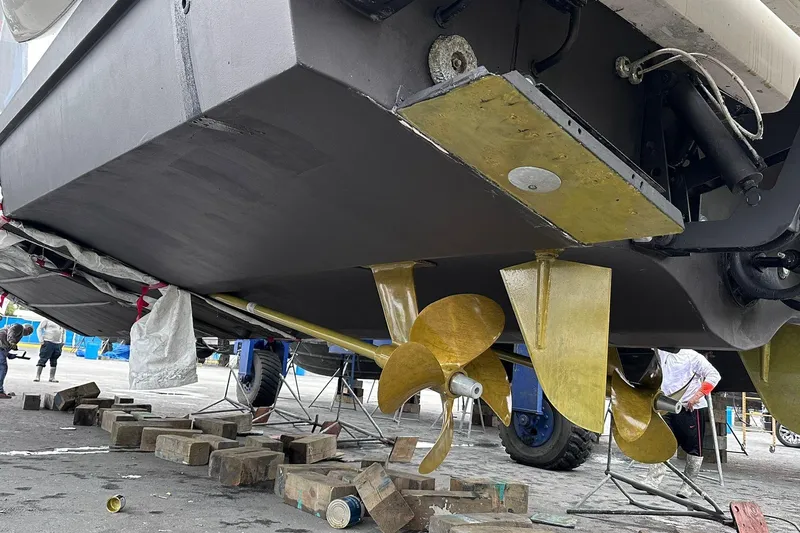  Yacht Photos Pics Underwater view of 2014 Azimut 54 yacht with visible propellers and hull details.