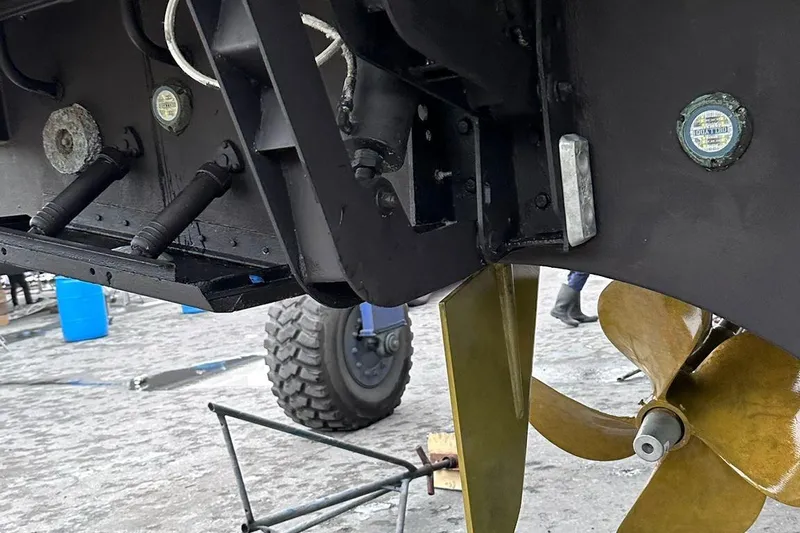  Yacht Photos Pics Close-up of 2014 Azimut 54 yacht's propeller and hull details.