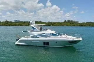  Yacht Photos Pics 2014 Azimut 54 yacht cruising on a sunny day with clear skies.