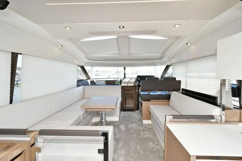 Yacht Photos Pics Luxurious interior of 2019 Prestige 460 yacht with modern seating and elegant design.