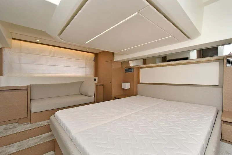  Yacht Photos Pics Luxurious interior of 2019 Prestige 460 yacht with modern bedroom design.
