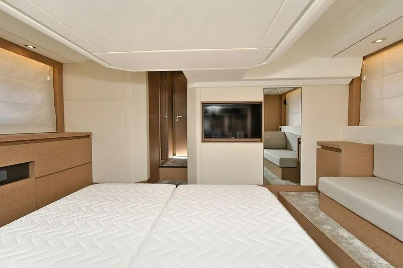  Yacht Photos Pics Luxurious interior of 2019 Prestige 460 yacht with modern furnishings and elegant design.