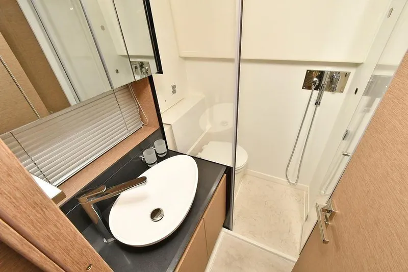  Yacht Photos Pics Modern bathroom in 2019 Prestige 460 yacht with sleek sink and shower.