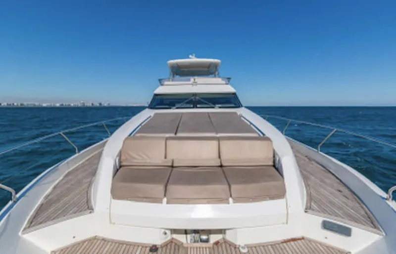 The Good Life Yacht Photos Pics Prestige 75 yacht 2015 model cruising on open sea with clear blue sky.