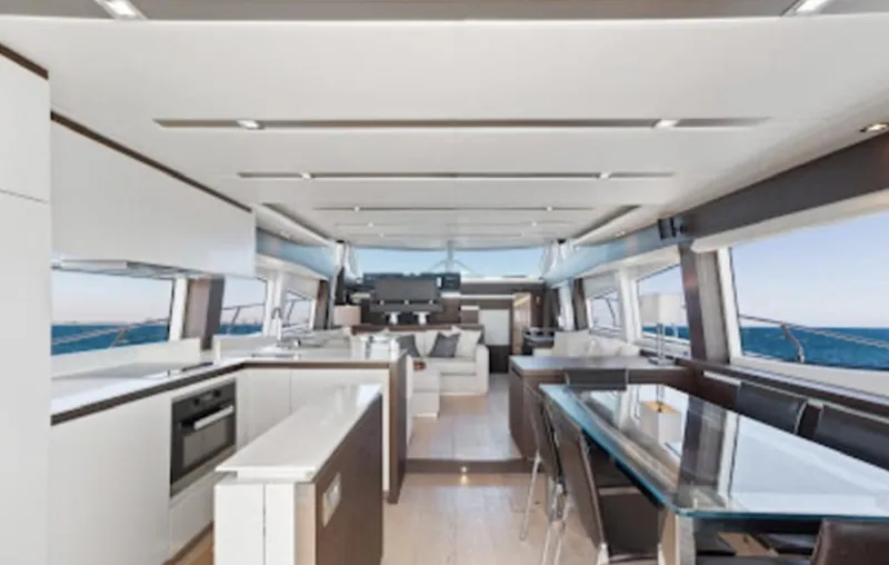 The Good Life Yacht Photos Pics Luxurious interior of 2015 Prestige 75 yacht with modern kitchen and dining area.