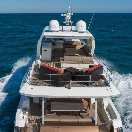 The Good Life Yacht Photos Pics Luxurious 2015 Prestige 75 yacht cruising on open sea.
