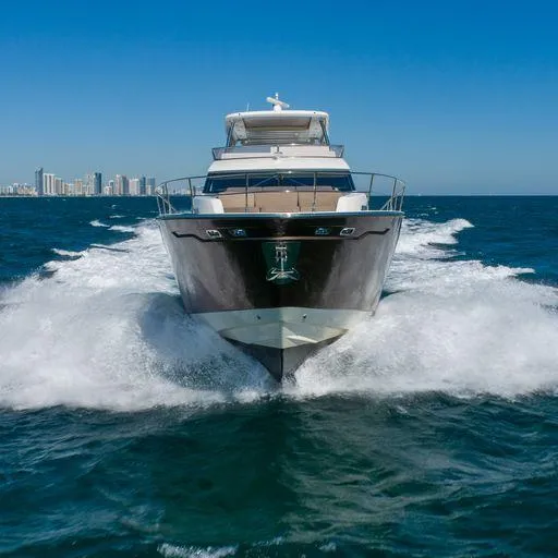 The Good Life Yacht Photos Pics Prestige 75 yacht cruising on open water, city skyline in background, 2015 model.