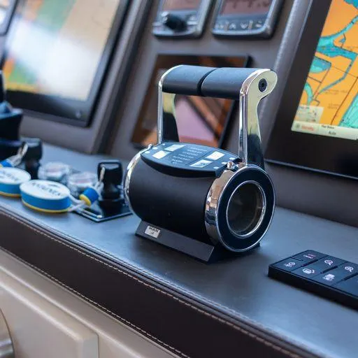 The Good Life Yacht Photos Pics Control panel of a 2015 Prestige 75 yacht with navigation screens.
