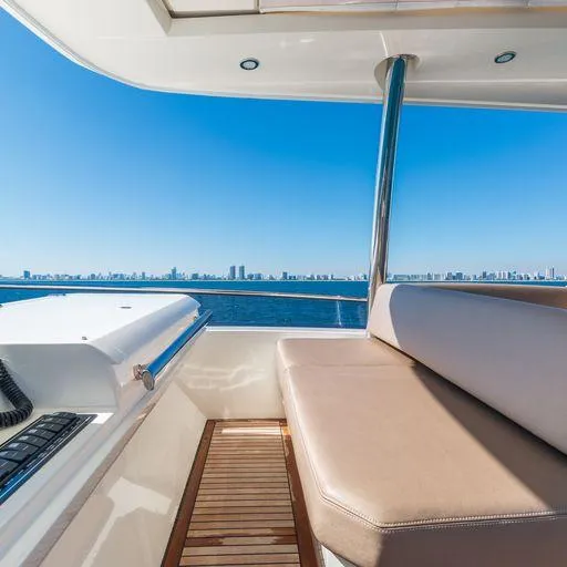 The Good Life Yacht Photos Pics Prestige 75 yacht 2015 model, luxurious deck with ocean and city skyline view.