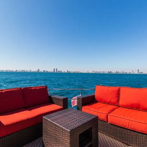 The Good Life Yacht Photos Pics Luxury yacht Prestige 75, 2015 model, with red seating and ocean view.