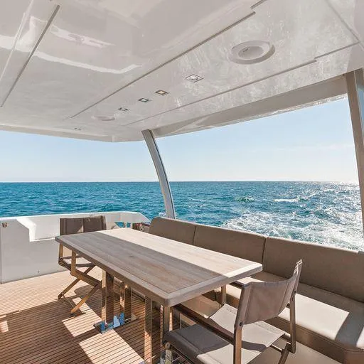 The Good Life Yacht Photos Pics Luxury yacht deck with dining area, Prestige 75, 2015 model.
