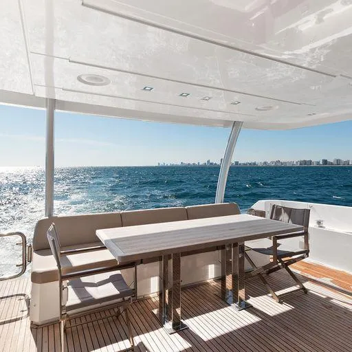 The Good Life Yacht Photos Pics Luxury yacht Prestige 75, 2015 model, with ocean view and dining area.