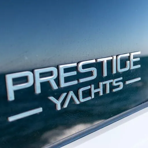 The Good Life Yacht Photos Pics Prestige Yachts logo on a 2015 Prestige 75 model yacht.