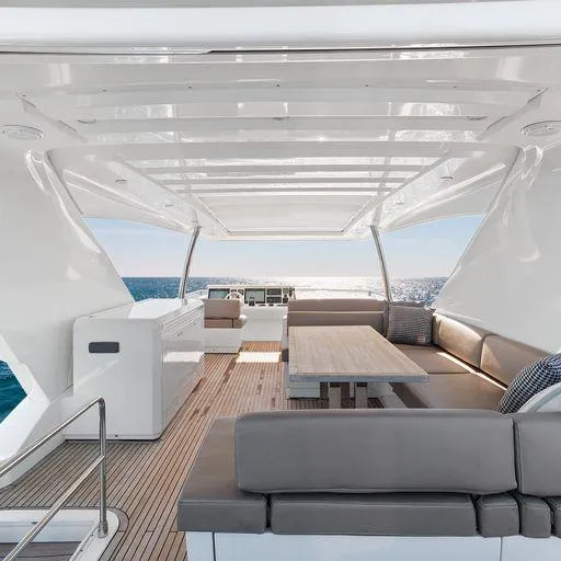 The Good Life Yacht Photos Pics Luxurious seating area on a 2015 Prestige 75 yacht with ocean view.