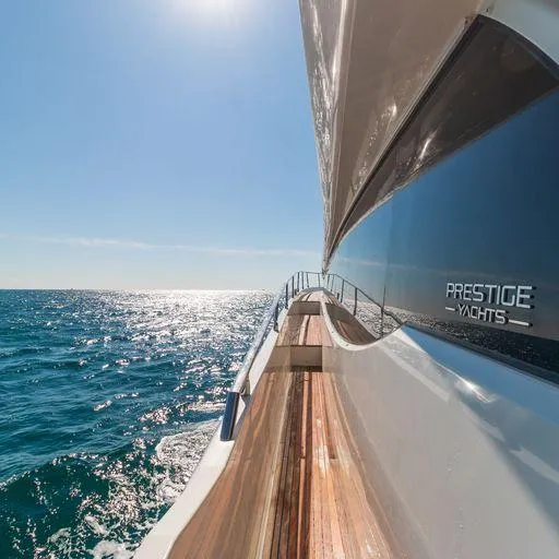 The Good Life Yacht Photos Pics Prestige 75 yacht cruising on open sea, 2015 model, sunny day.
