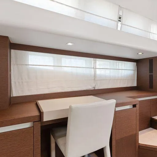 The Good Life Yacht Photos Pics Interior of 2015 Prestige 75 yacht with modern desk and chair.