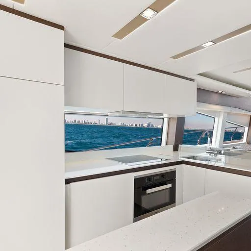 The Good Life Yacht Photos Pics Modern kitchen interior on a 2015 Prestige 75 yacht with ocean view.