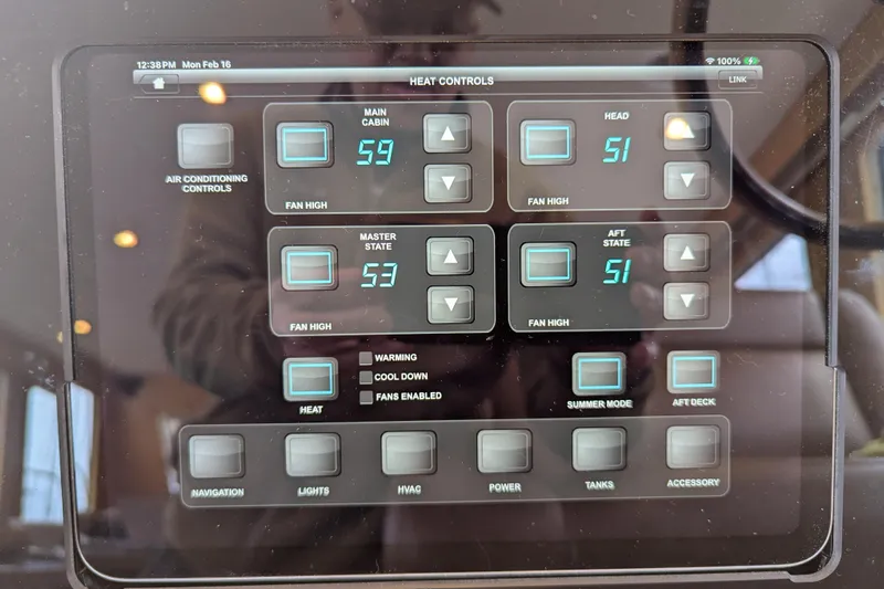 Alki Yacht Photos Pics Touchscreen displaying air conditioning controls on a 2013 Coastal Craft 45 yacht.