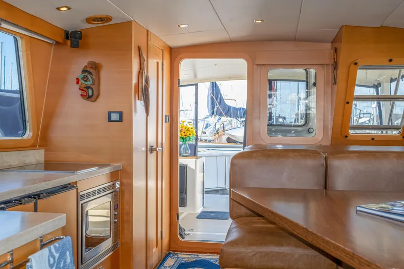 Alki Yacht Photos Pics Luxurious interior of 2013 Coastal Craft 45 yacht with modern amenities and elegant design.