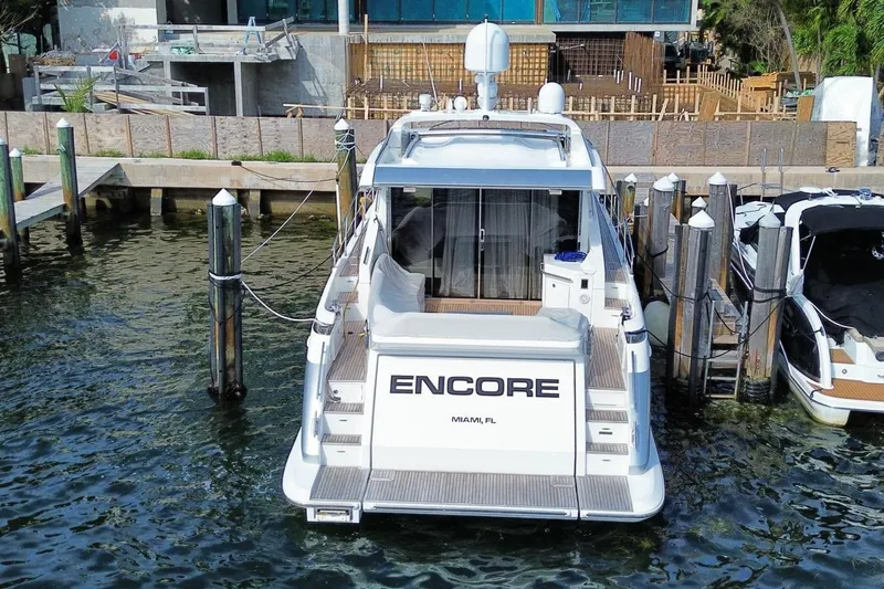 Encore Yacht Photos Pics 2015 Azimut 55S yacht docked, rear view, with "Encore" name, Miami location.