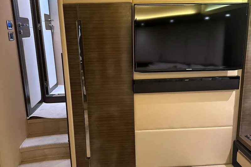 Encore Yacht Photos Pics Interior of 2015 Azimut 55S yacht with TV and soundbar setup.
