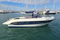 2007 Cranchi CSL 27 boat named Emma docked in a marina with clear skies.