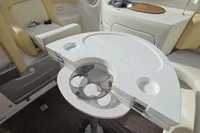 Interior of 2007 Cranchi CSL 27 boat with seating and table setup.