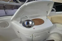 2007 Cranchi CSL 27 boat interior with sink and wooden countertop.