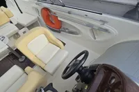 Interior of a 2007 Cranchi CSL 27 boat with steering wheel and seating.