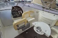2007 Cranchi CSL 27 boat interior with steering wheel, seating, and control panel.