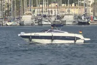 2007 Cranchi CSL 27 boat named Emma in a marina, surrounded by yachts.