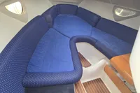 Interior of 2007 Cranchi CSL 27 boat with blue cushioned seating.