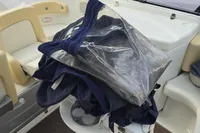 Folded boat cover on 2007 Cranchi CSL 27's seating area.