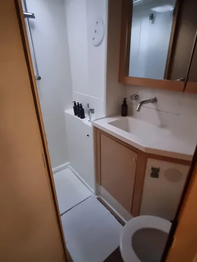 Fellowship Yacht Photos Pics 2017 Lagoon 450 F yacht bathroom with modern fixtures and compact design.